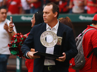 Horacio de la Vega, president of LMB, delivers the trophy of Champion South Zone of the Mexican Baseball League (LMB) to Diablos Rojos at th...