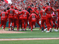 Diablos Rojos players celebrate at the end of match 7 of the Mexican Baseball League (LMB) South Zone 2024 championship series against Guerr...