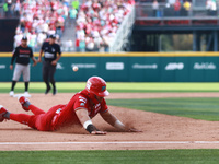 Ramon Flores #23 of Diablos Rojos slides to the third base plate during match 7 of the Mexican Baseball League (LMB) South Zone 2024 champio...