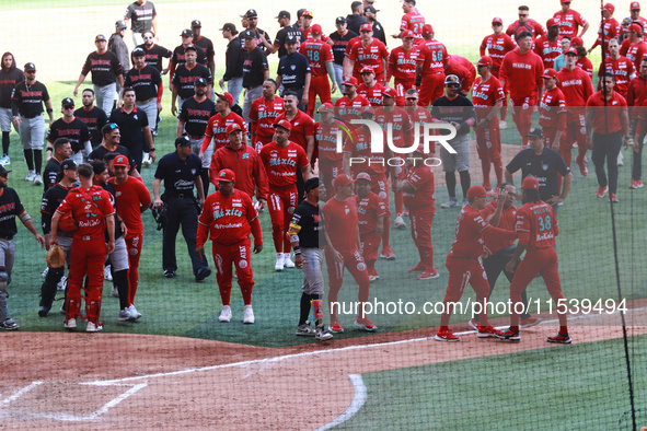 Diablos Rojos players celebrate at the end of match 7 of the Mexican Baseball League (LMB) South Zone 2024 championship series against Guerr...