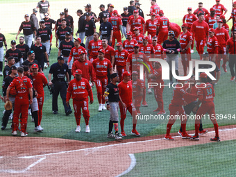 Diablos Rojos players celebrate at the end of match 7 of the Mexican Baseball League (LMB) South Zone 2024 championship series against Guerr...