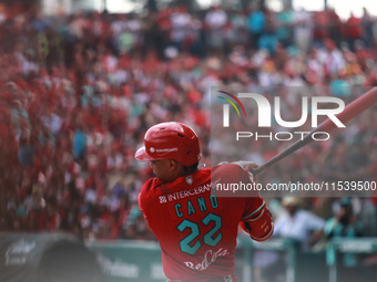 Robinson Cano #22 of Diablos Rojos bats during match 7 of the Mexican Baseball League (LMB) South Zone 2024 championship series against Guer...