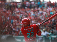 Robinson Cano #22 of Diablos Rojos bats during match 7 of the Mexican Baseball League (LMB) South Zone 2024 championship series against Guer...