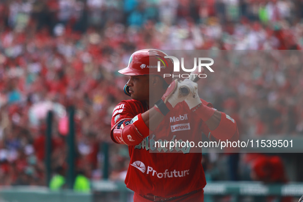 Robinson Cano #22 of Diablos Rojos bats during match 7 of the Mexican Baseball League (LMB) South Zone 2024 championship series against Guer...