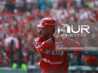 Robinson Cano #22 of Diablos Rojos bats during match 7 of the Mexican Baseball League (LMB) South Zone 2024 championship series against Guer...