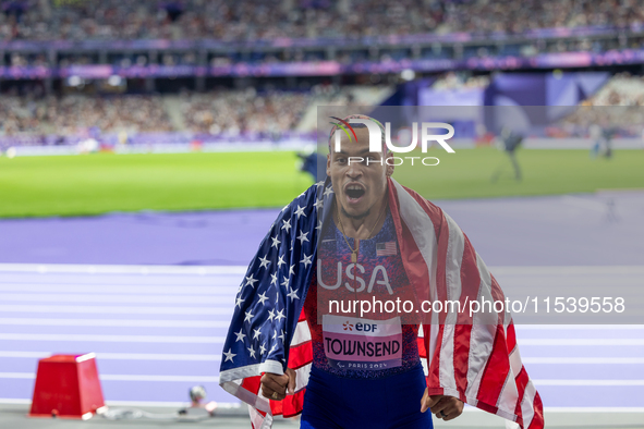 Roderick Townsend-Roberts of the United States of America reacts after he wins the gold medal during the Men's High Jump - T47 at Stade de F...