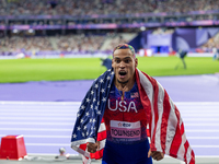 Roderick Townsend-Roberts of the United States of America reacts after he wins the gold medal during the Men's High Jump - T47 at Stade de F...