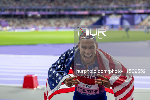 Roderick Townsend-Roberts of the United States of America reacts after he wins the gold medal during the Men's High Jump - T47 at Stade de F...