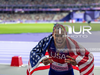 Roderick Townsend-Roberts of the United States of America reacts after he wins the gold medal during the Men's High Jump - T47 at Stade de F...