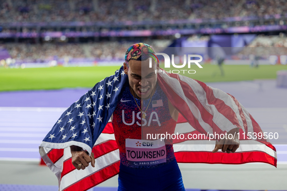 Roderick Townsend-Roberts of the United States of America reacts after he wins the gold medal during the Men's High Jump - T47 at Stade de F...