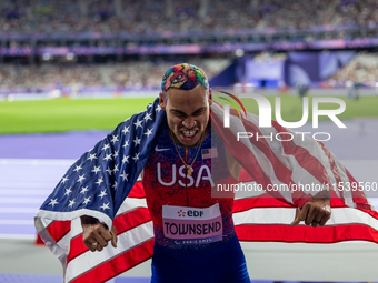 Roderick Townsend-Roberts of the United States of America reacts after he wins the gold medal during the Men's High Jump - T47 at Stade de F...