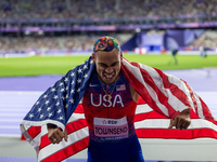 Roderick Townsend-Roberts of the United States of America reacts after he wins the gold medal during the Men's High Jump - T47 at Stade de F...