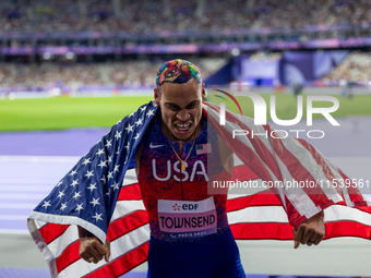 Roderick Townsend-Roberts of the United States of America reacts after he wins the gold medal during the Men's High Jump - T47 at Stade de F...