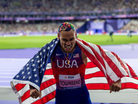 Roderick Townsend-Roberts of the United States of America reacts after he wins the gold medal during the Men's High Jump - T47 at Stade de F...