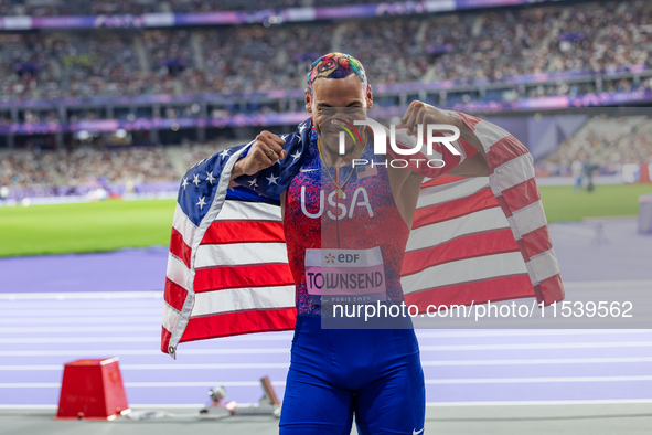 Roderick Townsend-Roberts of the United States of America reacts after he wins the gold medal during the Men's High Jump - T47 at Stade de F...