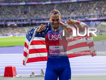 Roderick Townsend-Roberts of the United States of America reacts after he wins the gold medal during the Men's High Jump - T47 at Stade de F...