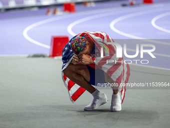 Roderick Townsend-Roberts of the United States of America reacts after he wins the gold medal during the Men's High Jump - T47 at Stade de F...