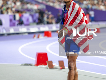 Roderick Townsend-Roberts of the United States of America reacts after he wins the gold medal during the Men's High Jump - T47 at Stade de F...