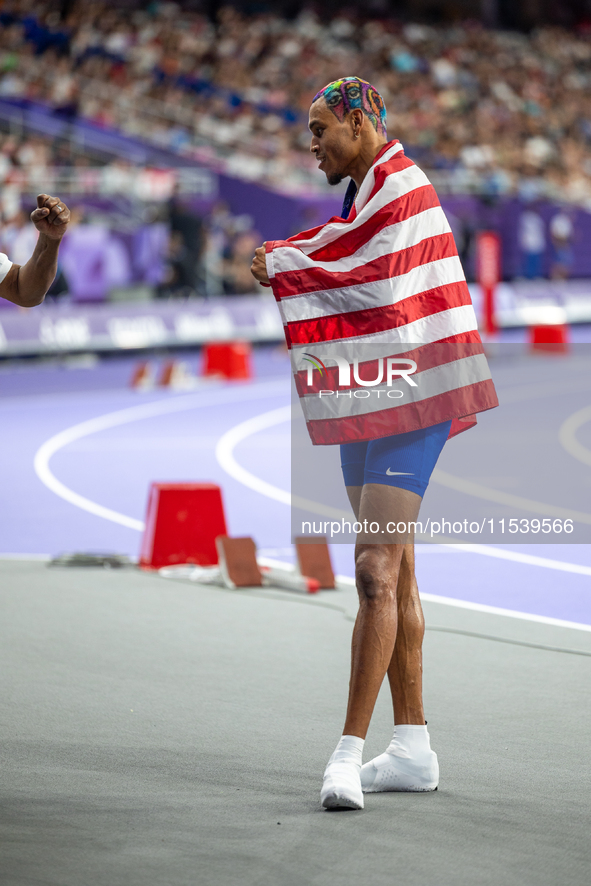 Roderick Townsend-Roberts of the United States of America reacts after he wins the gold medal during the Men's High Jump - T47 at Stade de F...