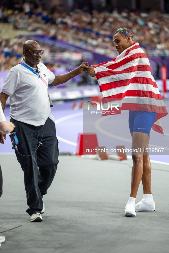 Roderick Townsend-Roberts of the United States of America reacts after he wins the gold medal during the Men's High Jump - T47 at Stade de F...