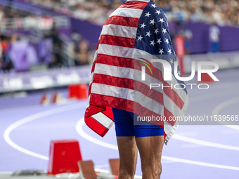 Roderick Townsend-Roberts of the United States of America reacts after he wins the gold medal during the Men's High Jump - T47 at Stade de F...