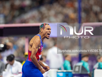 Roderick Townsend-Roberts of the United States of America reacts after he wins the gold medal during the Men's High Jump - T47 at Stade de F...