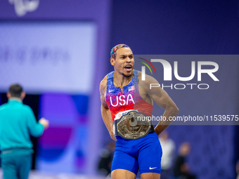 Roderick Townsend-Roberts of the United States of America reacts after he wins the gold medal during the Men's High Jump - T47 at Stade de F...