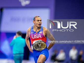 Roderick Townsend-Roberts of the United States of America reacts after he wins the gold medal during the Men's High Jump - T47 at Stade de F...