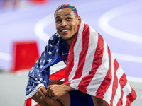 Roderick Townsend-Roberts of the United States of America reacts after he wins the gold medal during the Men's High Jump - T47 at Stade de F...