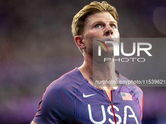 Hunter Woodall of the United States of America reacts after Men's 100m - T64 Round 1 - Heat 2 at Stade de France during the Paris 2024 Paral...