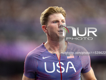 Hunter Woodall of the United States of America reacts after Men's 100m - T64 Round 1 - Heat 2 at Stade de France during the Paris 2024 Paral...