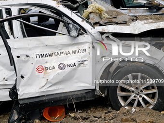 A car is damaged by the Russian missile attack in Kyiv, Ukraine, on September 2, 2024. NO USE RUSSIA. NO USE BELARUS. (