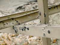 A piece of metal on Beresteiskyi Avenue is dotted with shrapnel holes after the Russian missile attack in Kyiv, Ukraine, on September 2, 202...