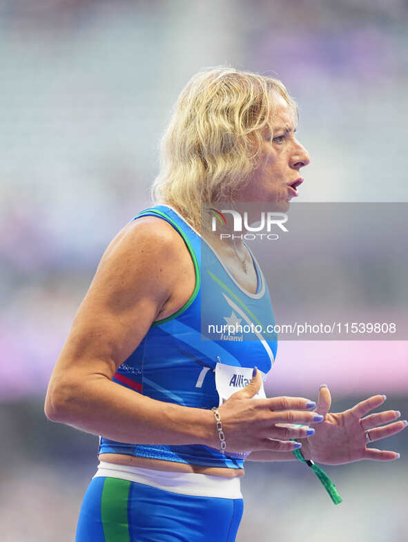 Valentina Petrillo of Italy in action in Women's 400m - T12 Round 1 during the Paris 2024 Paralympic Games at Stade de France on September 2...