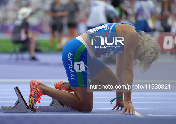 Valentina Petrillo of Italy in action in Women's 400m - T12 Round 1 during the Paris 2024 Paralympic Games at Stade de France on September 2...