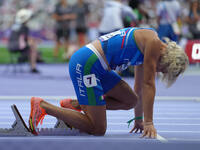 Valentina Petrillo of Italy in action in Women's 400m - T12 Round 1 during the Paris 2024 Paralympic Games at Stade de France on September 2...