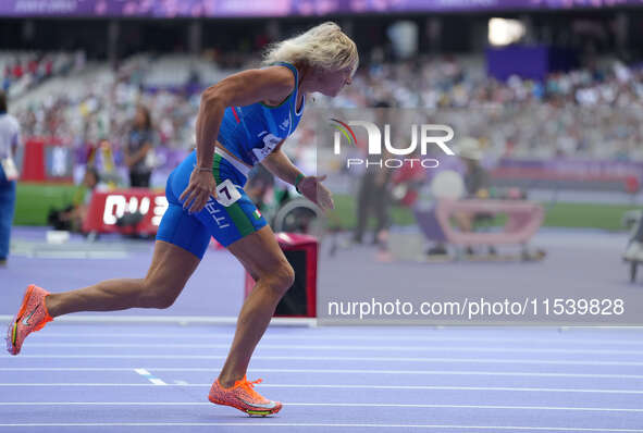 Valentina Petrillo of Italy in action in Women's 400m - T12 Round 1 during the Paris 2024 Paralympic Games at Stade de France on September 2...