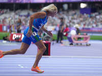 Valentina Petrillo of Italy in action in Women's 400m - T12 Round 1 during the Paris 2024 Paralympic Games at Stade de France on September 2...