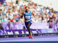 Valentina Petrillo of Italy in action in Women's 400m - T12 Round 1 during the Paris 2024 Paralympic Games at Stade de France on September 2...