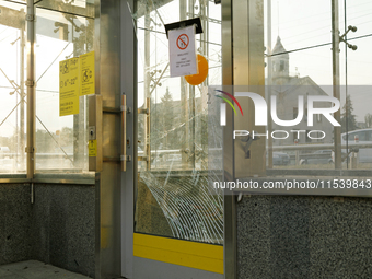 Cracked doors are at the Sviatoshyn metro station in the Sviatoshynskyi district after the Russian missile attack in Kyiv, Ukraine, on Septe...