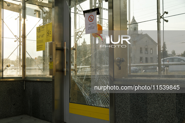 Cracked doors are at the Sviatoshyn metro station in the Sviatoshynskyi district after the Russian missile attack in Kyiv, Ukraine, on Septe...