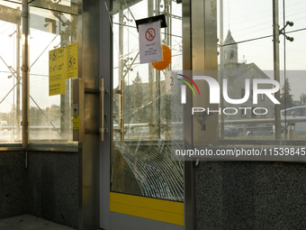 Cracked doors are at the Sviatoshyn metro station in the Sviatoshynskyi district after the Russian missile attack in Kyiv, Ukraine, on Septe...