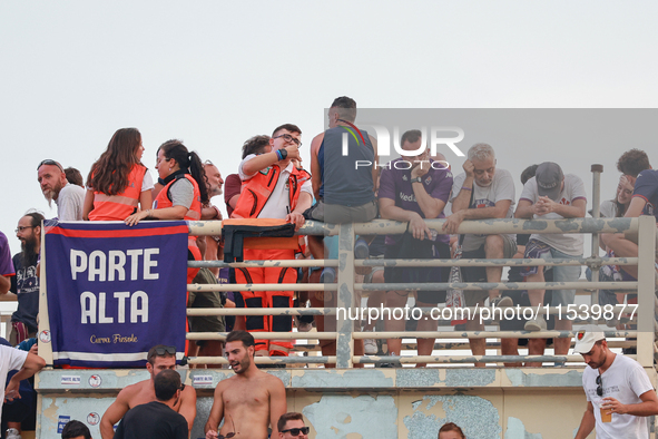 Supporters of ACF Fiorentina during the Italian Serie A football match between ACF Fiorentina and A.C. Monza in Florence, Italy, on Septembe...