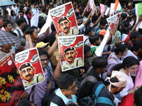 Medical students and doctors shout slogans during a protest rally towards Kolkata Police Headquarters, Lalbazar, protesting against the rape...