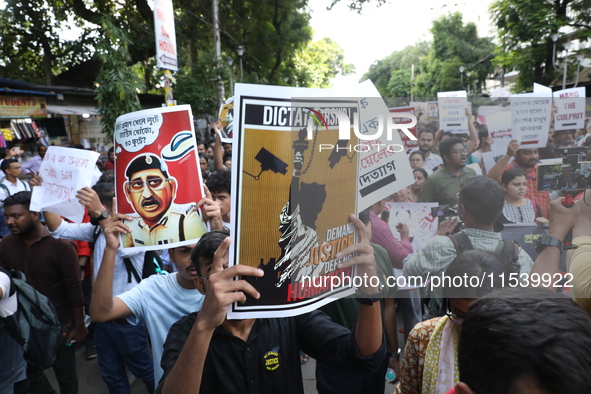 Medical students and doctors shout slogans during a protest rally towards Kolkata Police Headquarters, Lalbazar, protesting against the rape...