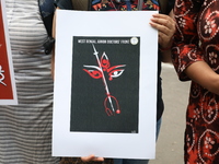 Medical students and doctors shout slogans during a protest rally towards Kolkata Police Headquarters, Lalbazar, protesting against the rape...