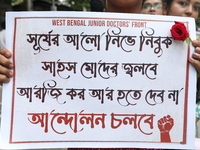 Medical students and doctors shout slogans during a protest rally towards Kolkata Police Headquarters, Lalbazar, protesting against the rape...