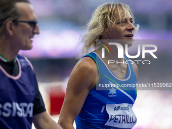 Valentina Petrillo of Team Italy warms up before competing in the Women's 400m T12 Heat 4 at Stade de France during the Paris 2024 Paralympi...