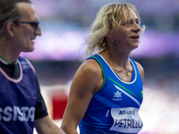 Valentina Petrillo of Team Italy warms up before competing in the Women's 400m T12 Heat 4 at Stade de France during the Paris 2024 Paralympi...