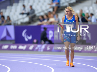 Valentina Petrillo of Team Italy warms up before competing in the Women's 400m T12 Heat 4 at Stade de France during the Paris 2024 Paralympi...